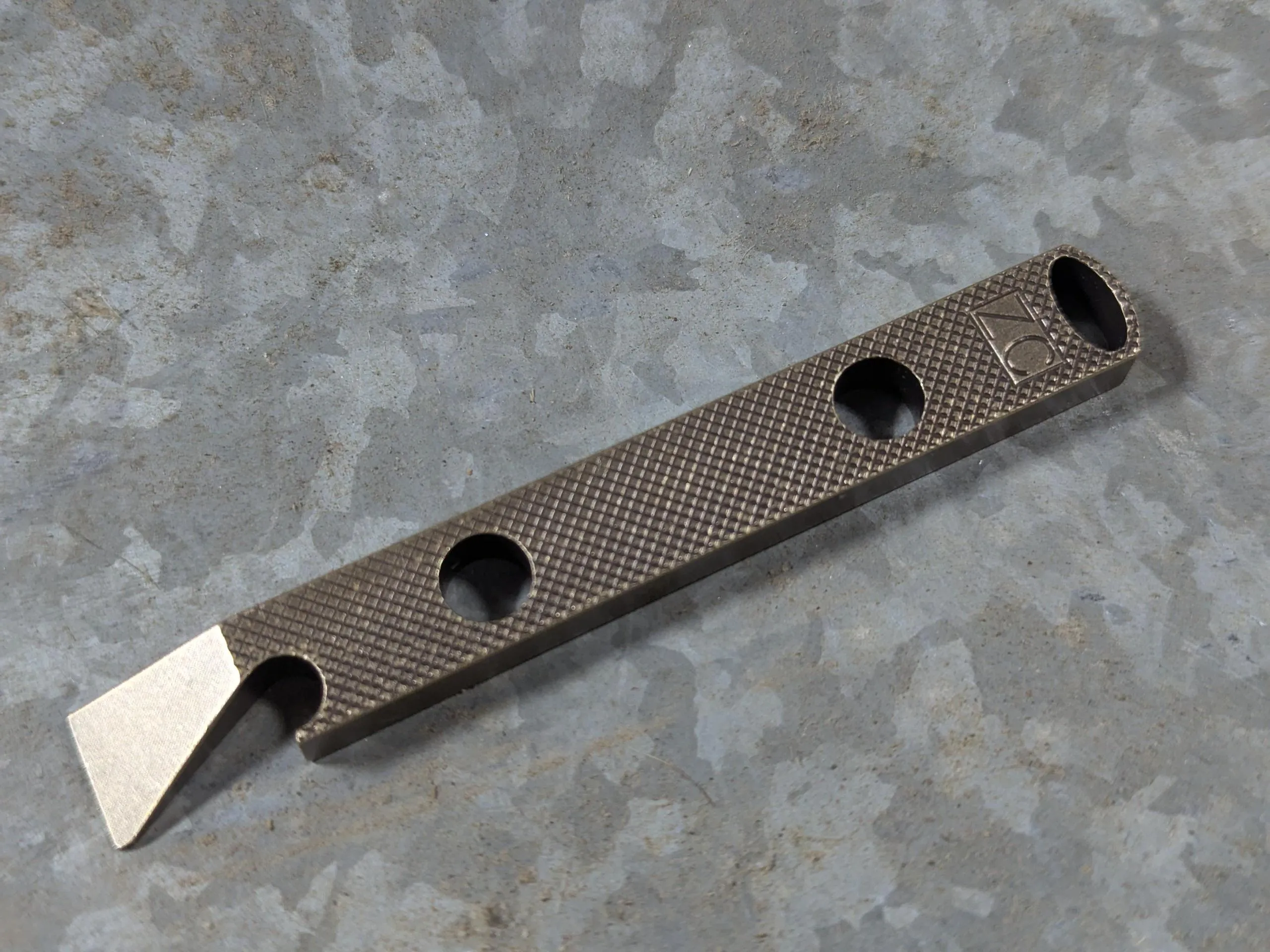 Brass Knurled Pattern Pry Bar with Patina