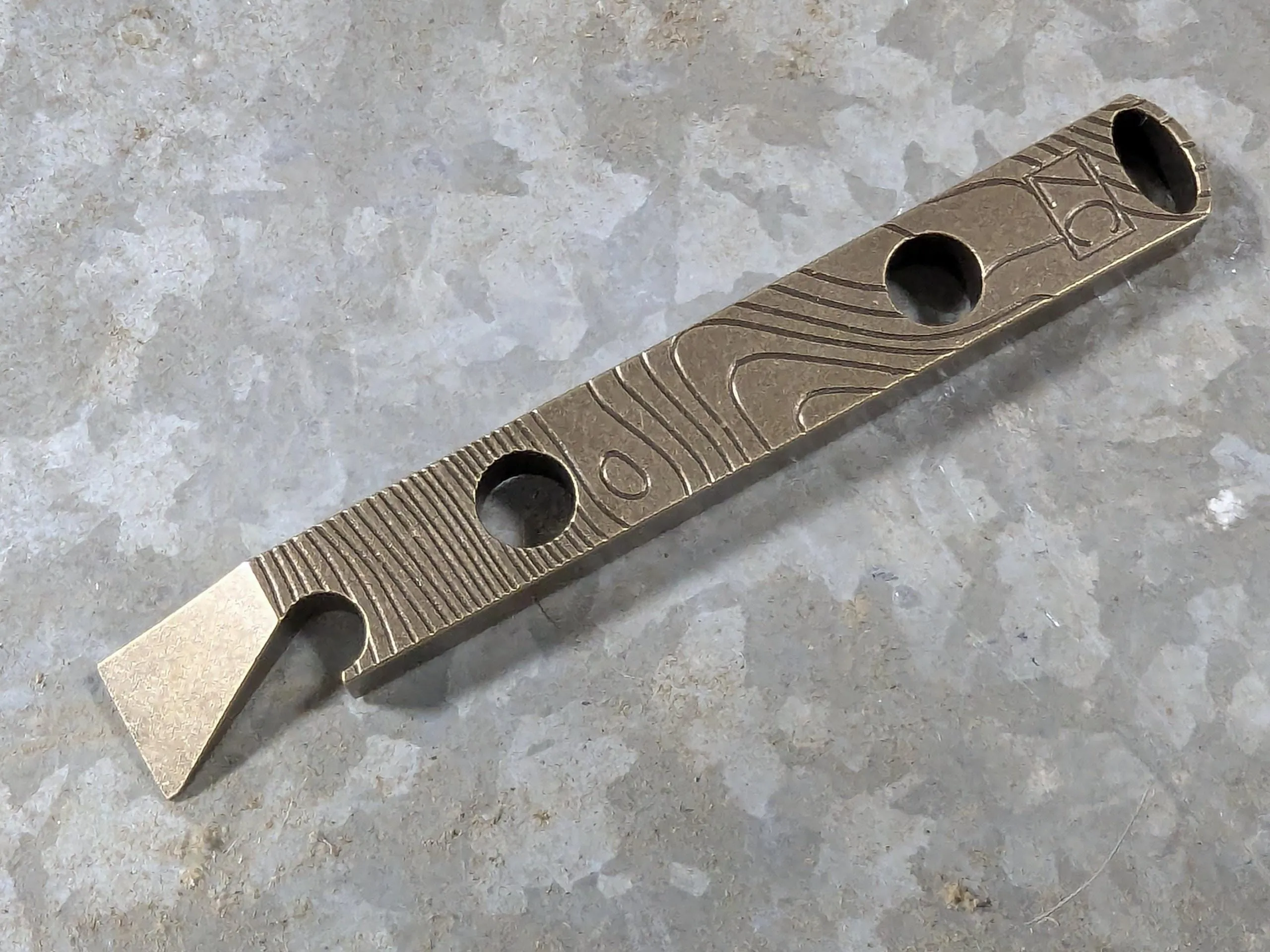 Brass Topo Pattern Pry Bar with Patina