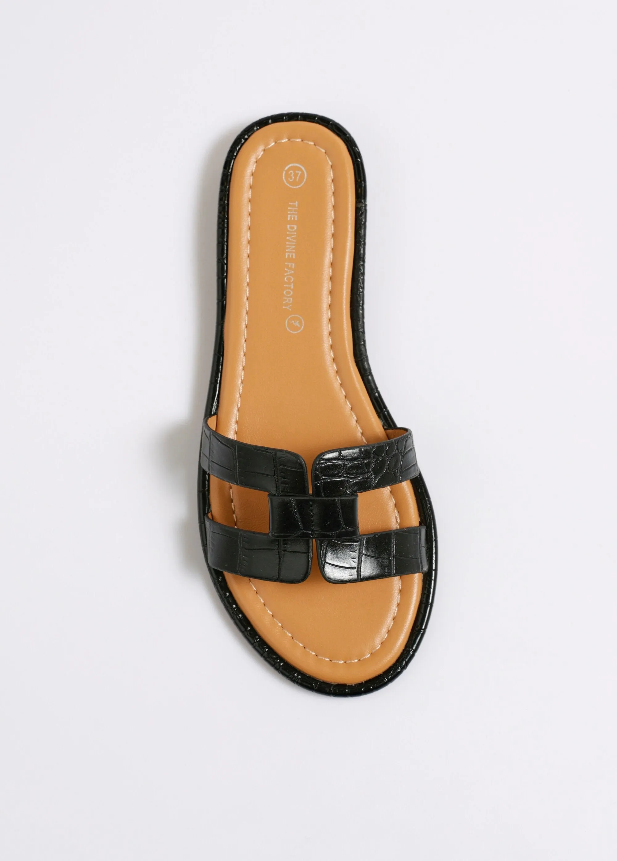 Chic crocodile-style flat mules