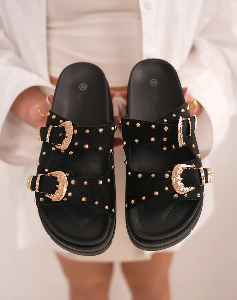 Mules femme noires à grosse plateforme tendance avec boucles dorées