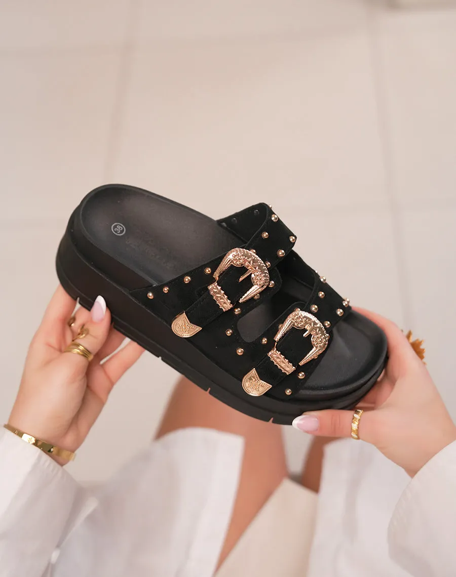 Mules femme noires à grosse plateforme tendance avec boucles dorées