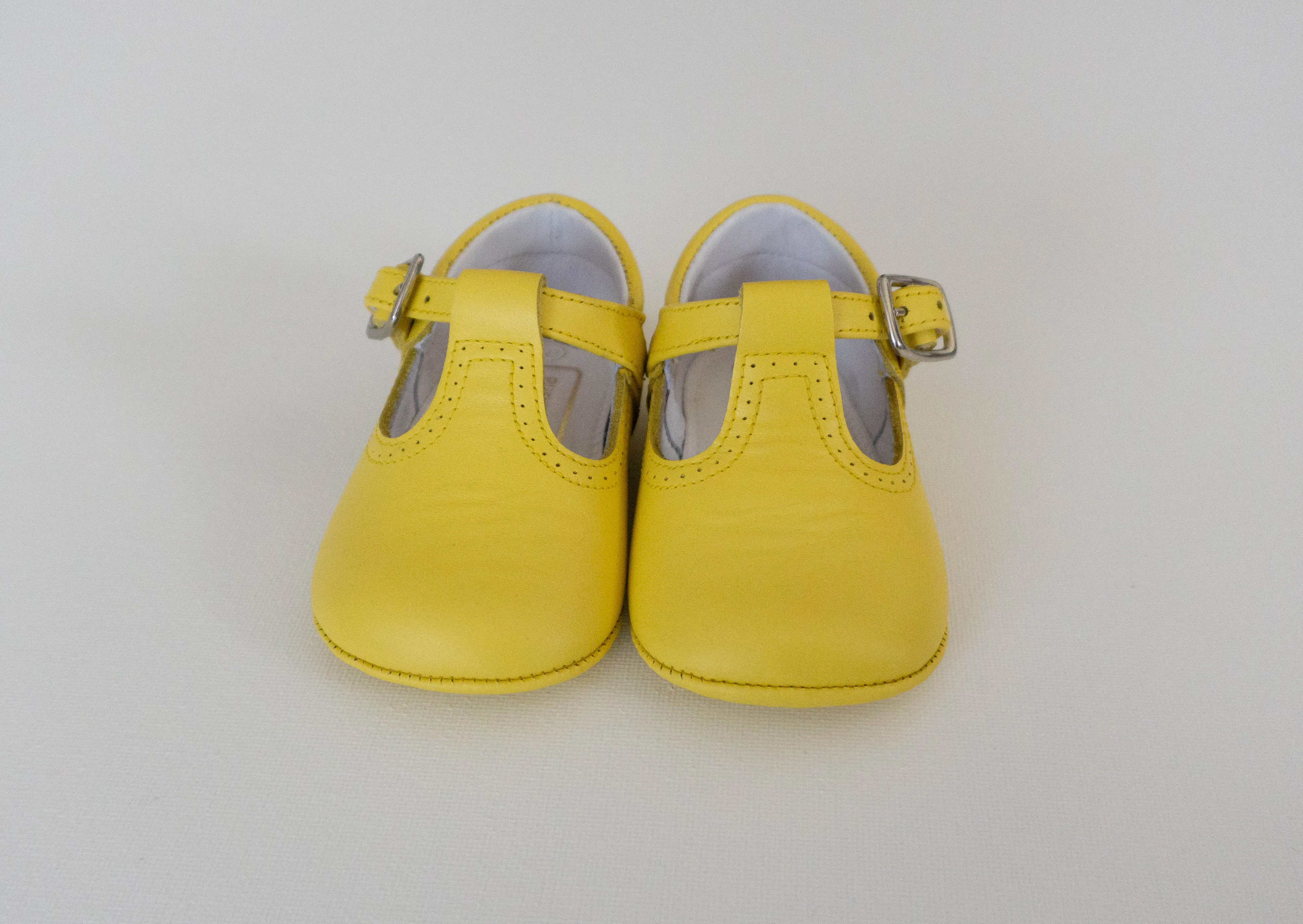 Yellow pram T-bar shoes