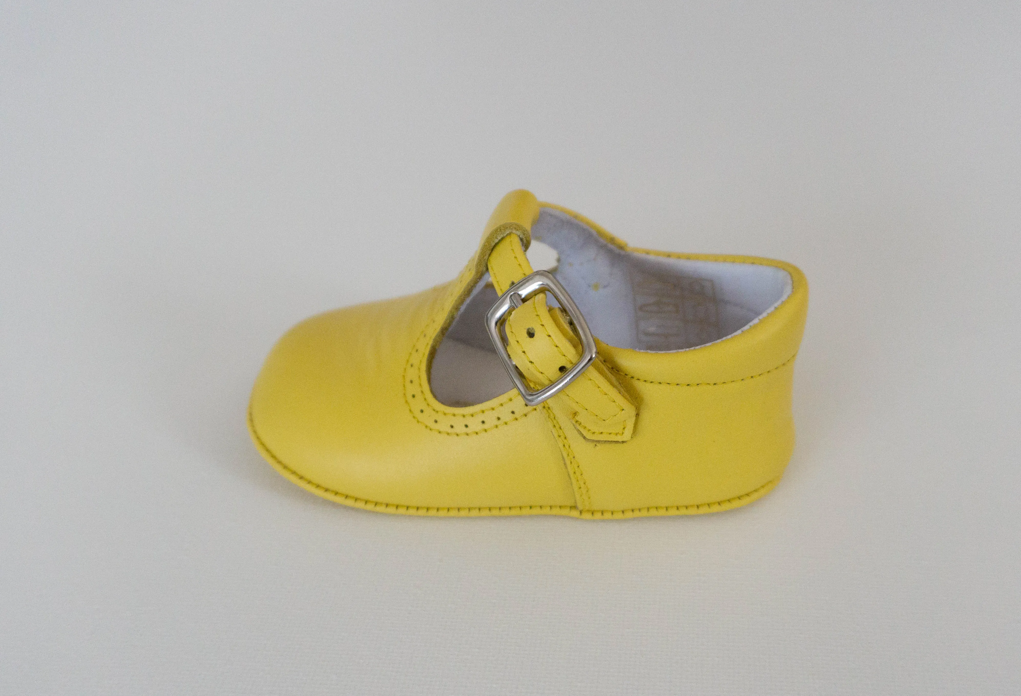 Yellow pram T-bar shoes