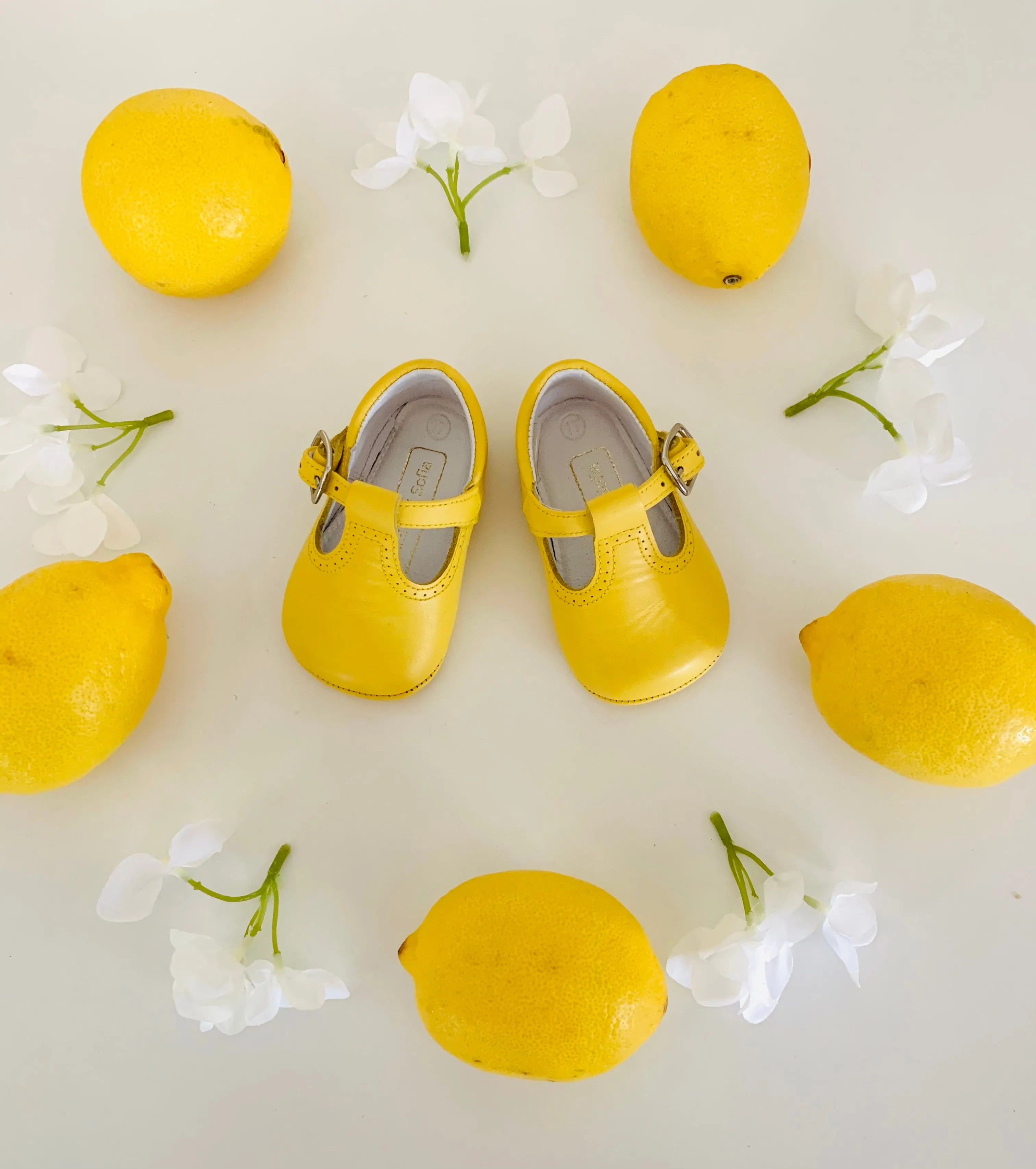 Yellow pram T-bar shoes